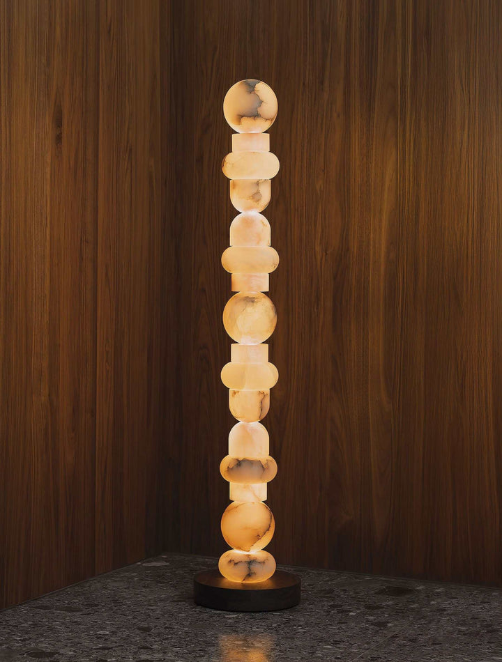 Totem Glow floor lamp with glowing stacked marble spheres for luxury interiors