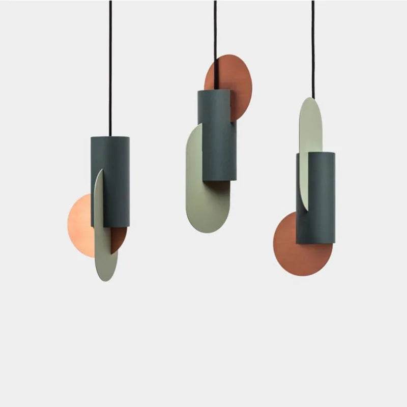 Geometric Modern Pendant LightsGeometric Modern Pendant LightsContemporary pendant lights featuring a bold geometric design with layered shapes in earthy and muted tones. A perfect statement piece for modern interiors.Pendant LightingWadi Home