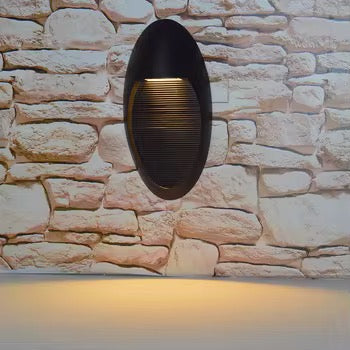 Sleek Oval Outdoor Wall Light with Downward Glow