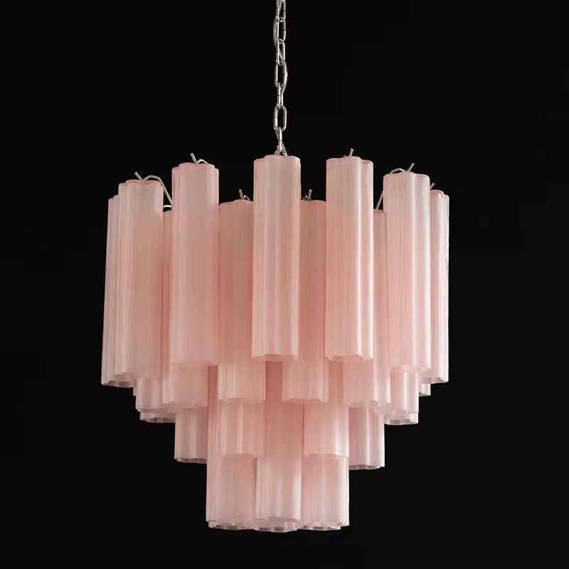 Blush pink ribbed glass chandelier with multiple layered pendant shades