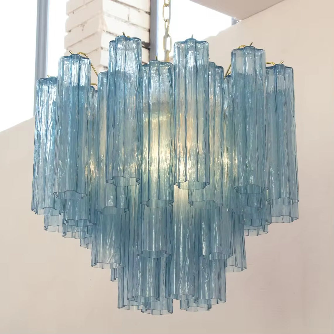 Blue ribbed glass chandelier with multiple layered textured glass shades