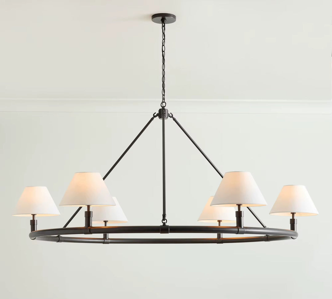 Modern six-light dark metal linear chandelier with white fabric shades