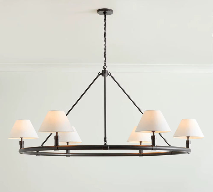 Modern six-light dark metal linear chandelier with white fabric shades