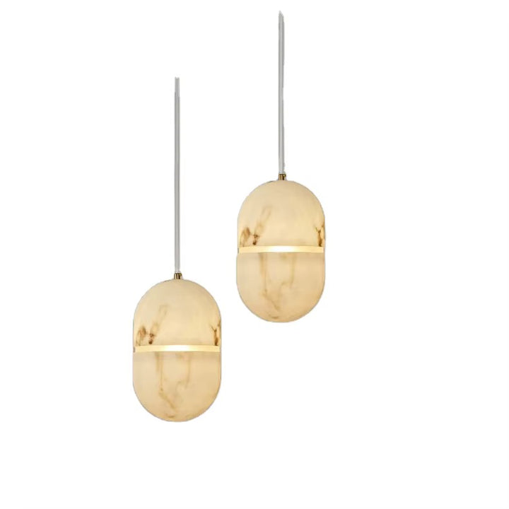 Pair of modern oval alabaster pendant lights with natural veining, brass bands, and slim suspension stems