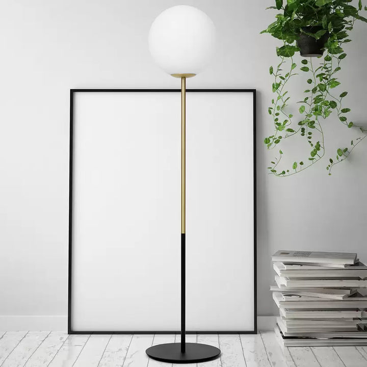 Modern Floor Lamp with White Globe Shade and Gold Accents