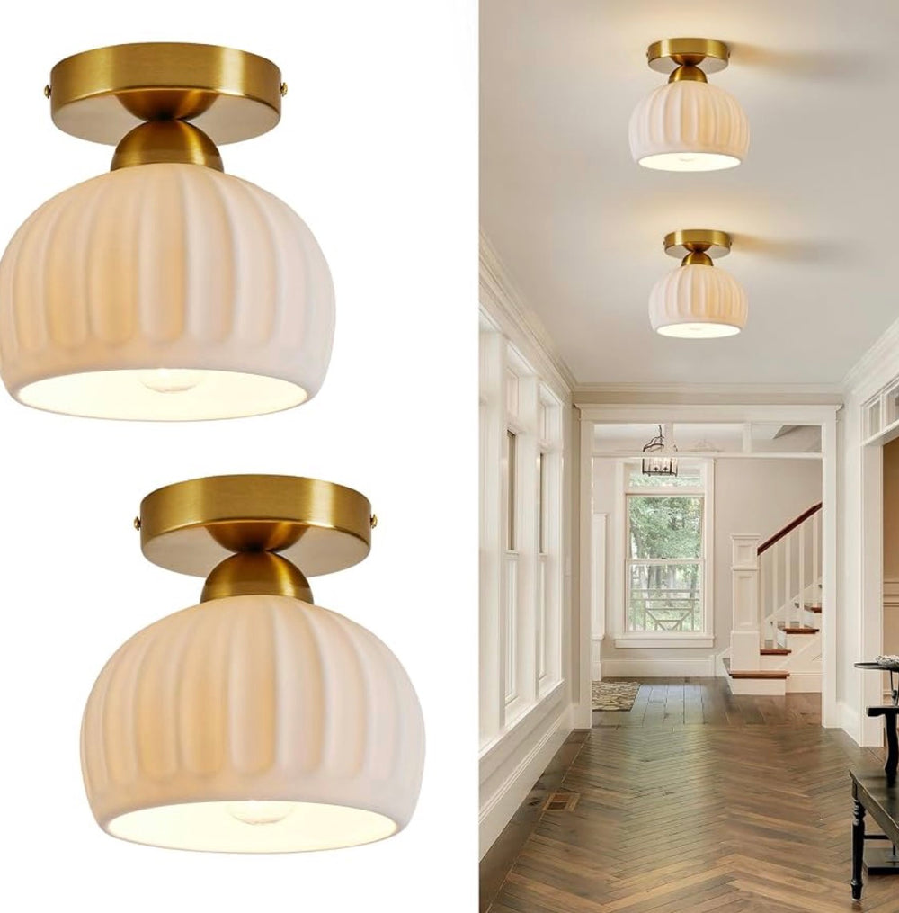 Modern flush mount ceiling light with ribbed opal glass shade and gold-toned metal mount