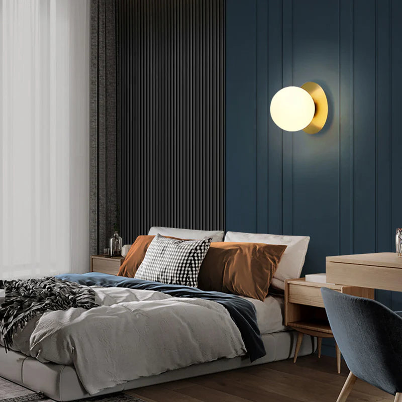 Modern Brass Wall Light with Circular Globe Shade