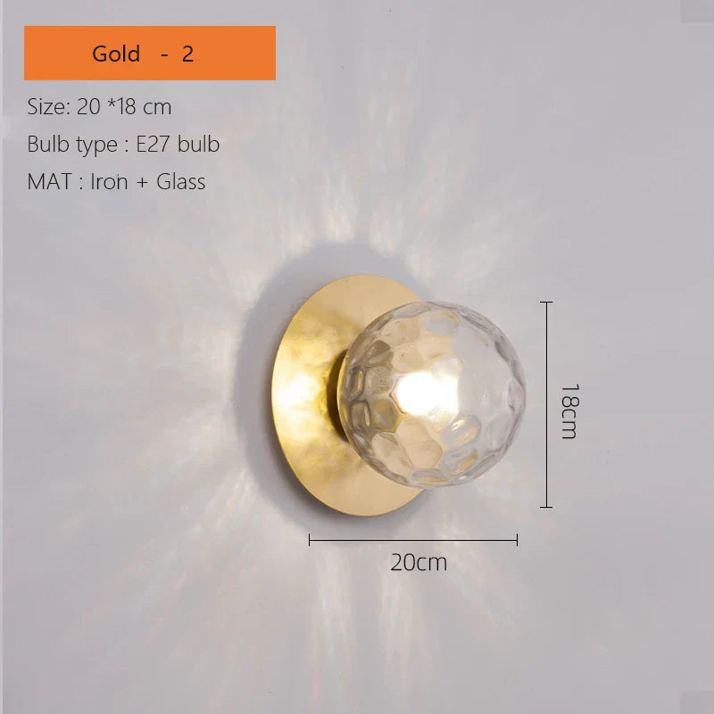 Modern Brass Wall Light with Circular Globe Shade