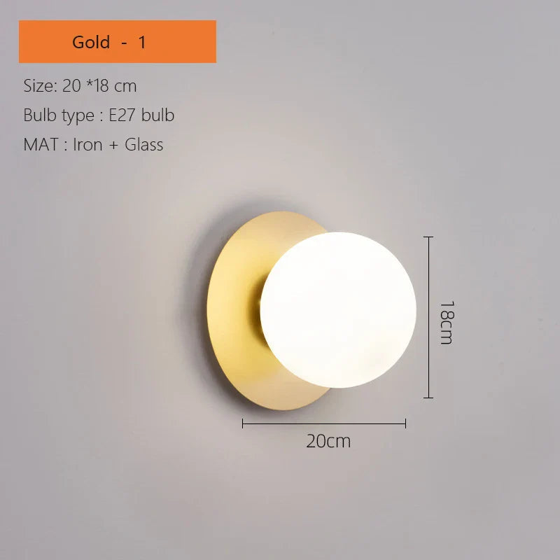 Modern Brass Wall Light with Circular Globe Shade