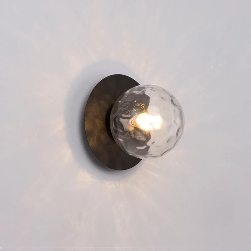 Modern Brass Wall Light with Circular Globe Shade