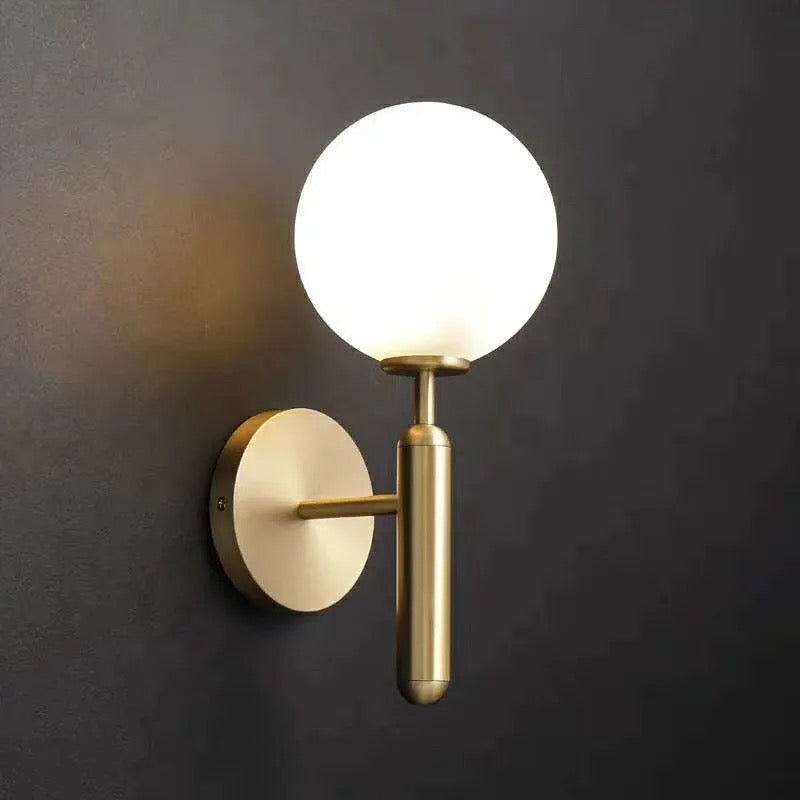 Modern Brass Wall Sconce with Globe Shade