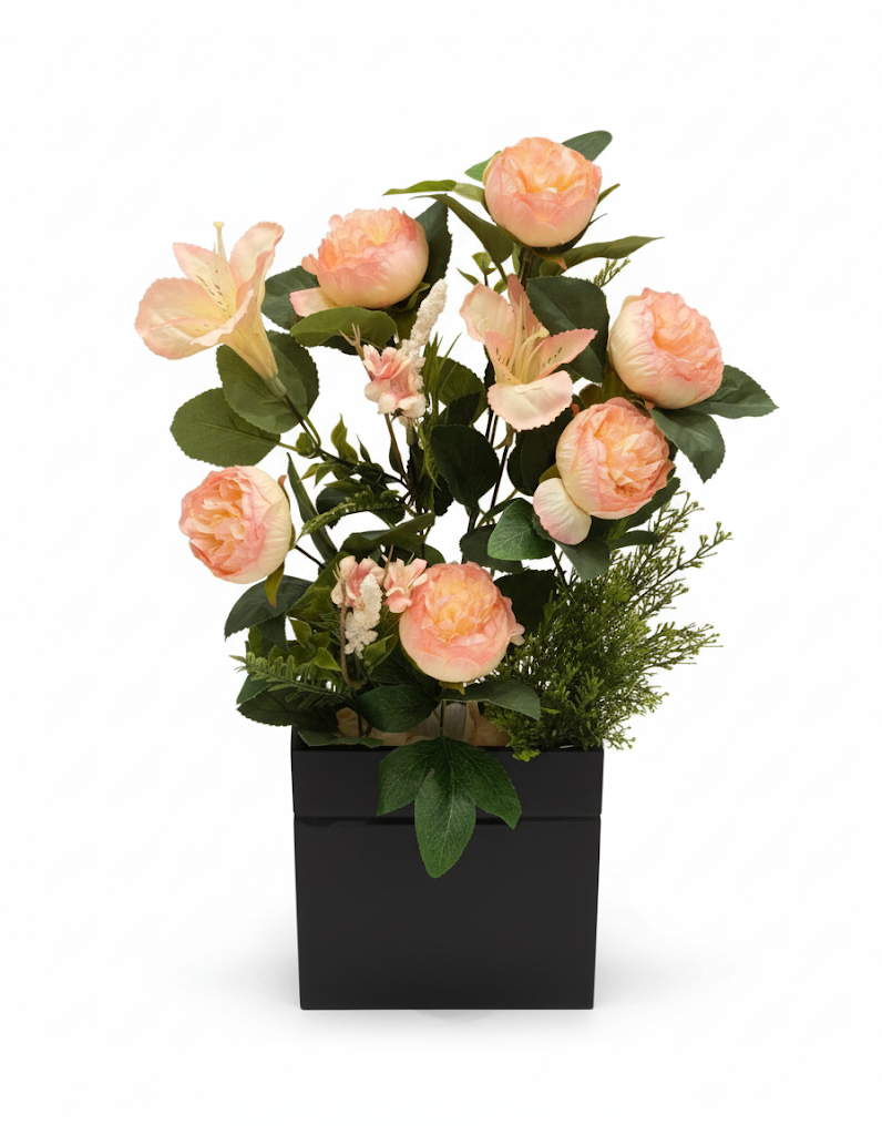 Artificial peach peony flower arrangement in black pot