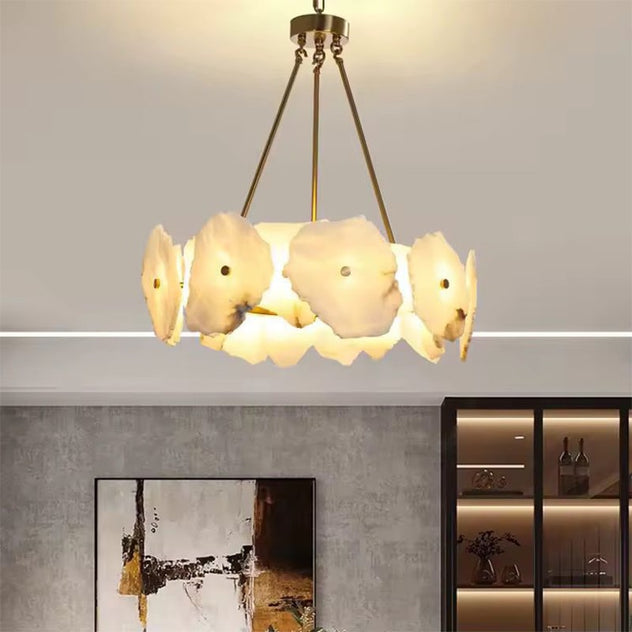 Modern floral glass pendant chandelier with warm white flower-shaped shades and brass-toned suspension