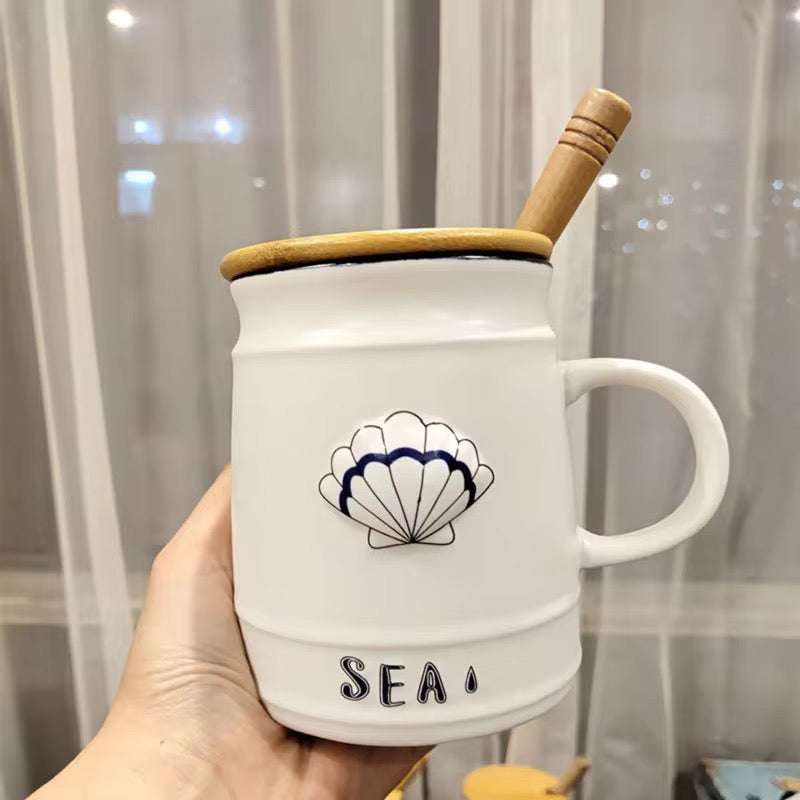 Elegant ceramic shell mug with lid for coastal kitchens