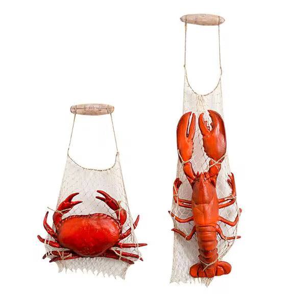 Decorative lobster crab decor in fishing net style for coastal interiors
