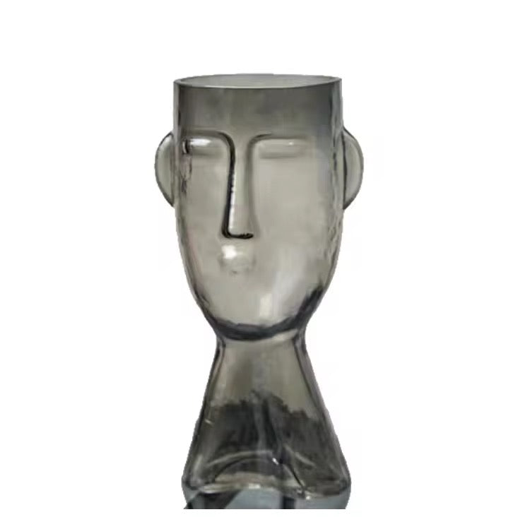 Faux Leaf Branches in Abstract Face Vase
