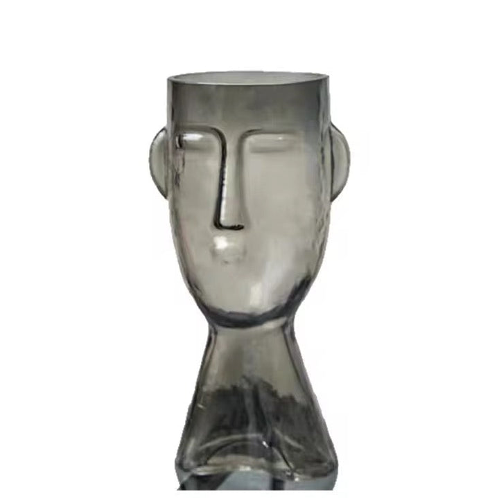 Faux Leaf Branches in Abstract Face Vase