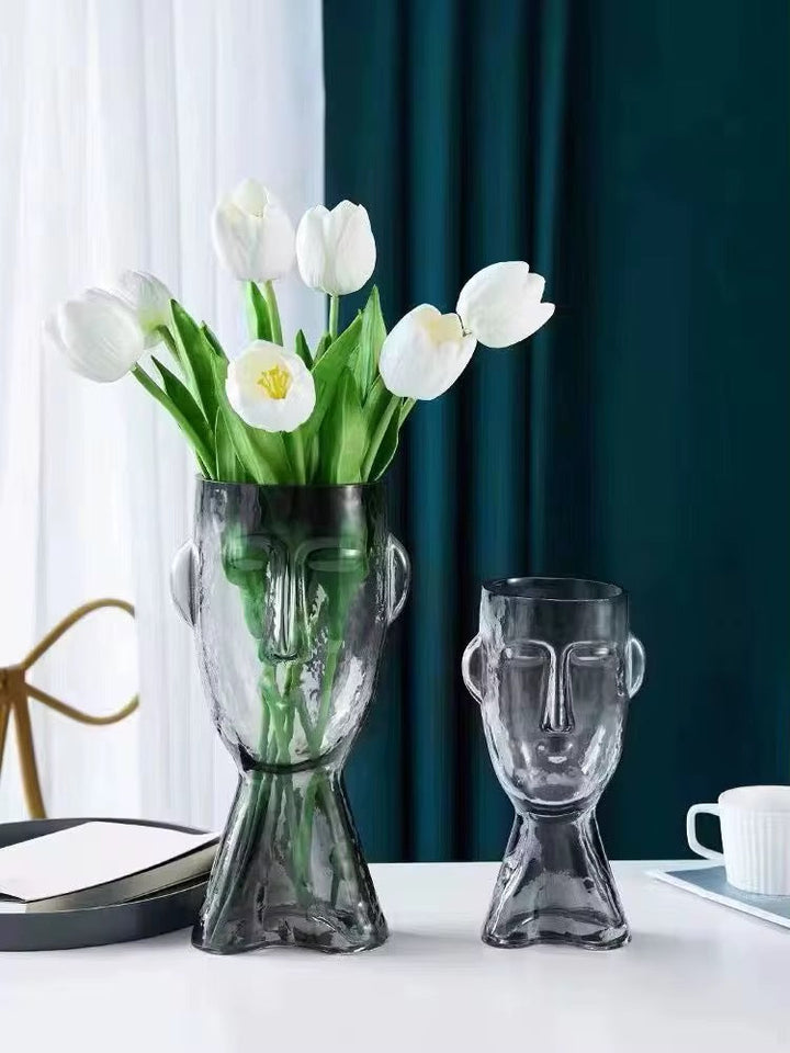 Faux Leaf Branches in Abstract Face Vase