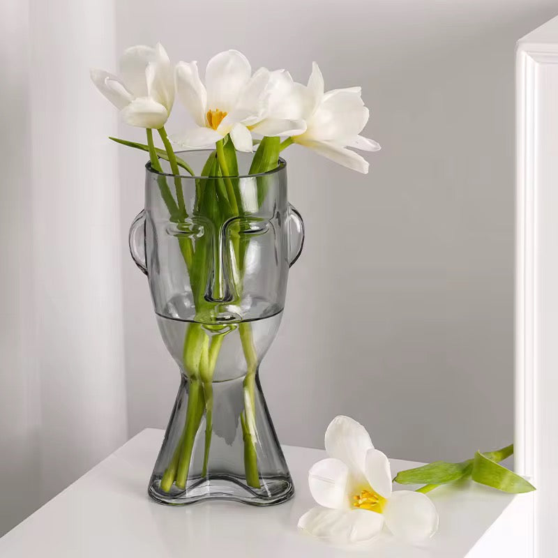 Faux Leaf Branches in Abstract Face Vase