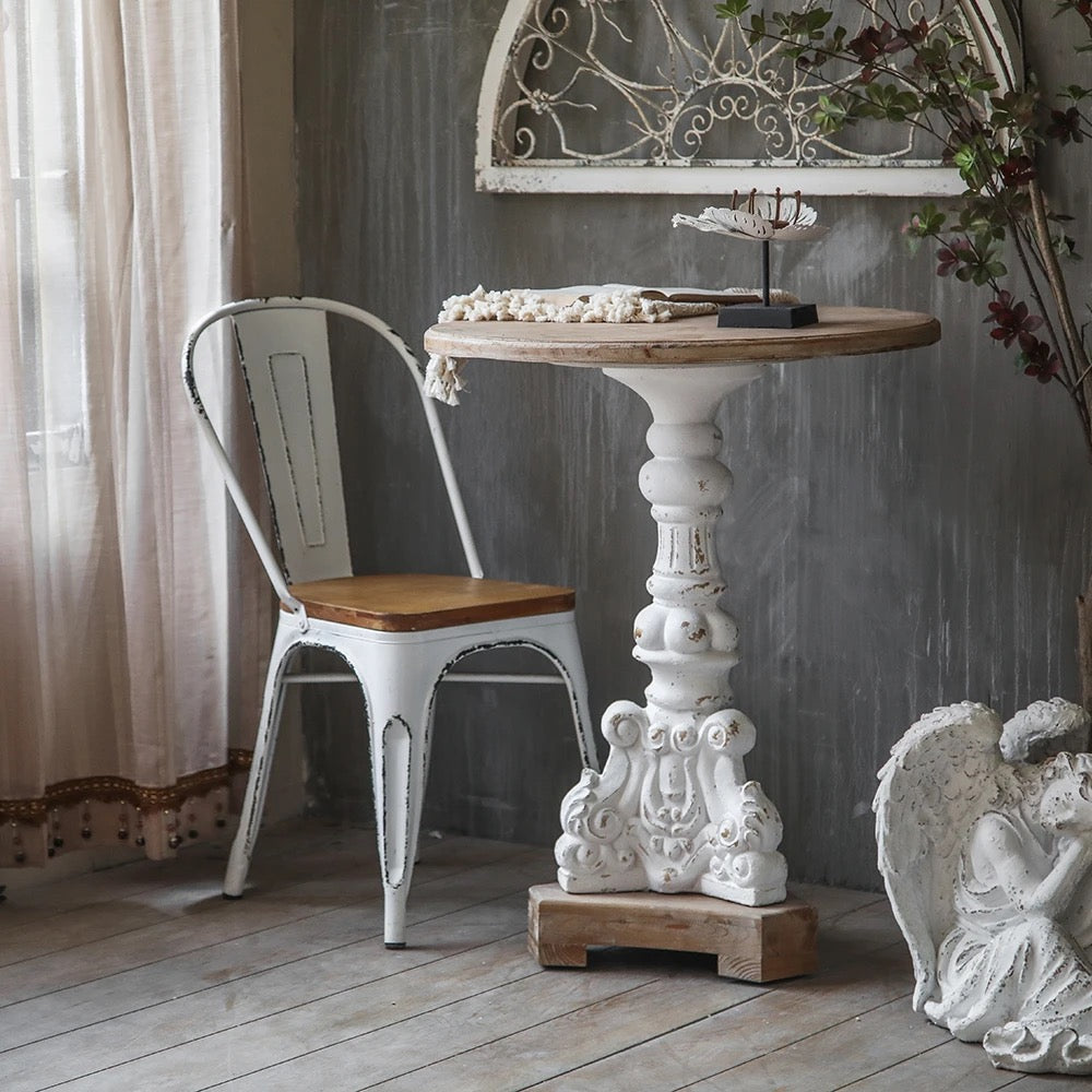 Vintage Rustic Round Accent Table with Ornate Carved Base