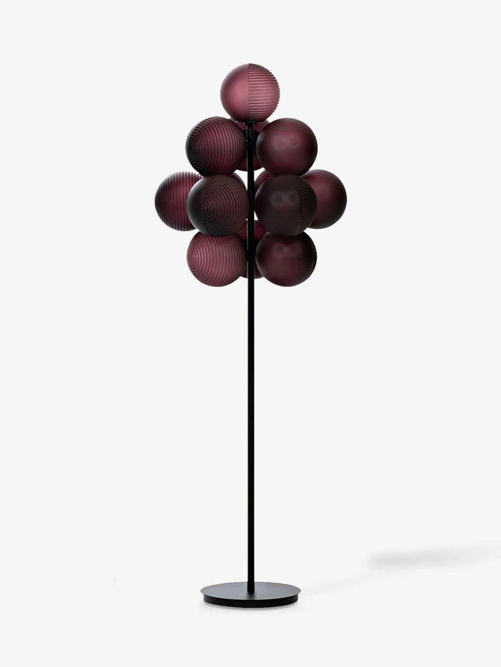 Designer Floor LampDesigner Floor Lamp with a Glass Globe Cluster Artistic LightingIntroduce a striking visual centerpiece with this designer floor lamp featuring a clustered arrangement of amber glass globes. 
Each globe offers a ribbed texture thFloor LampsWadi Home