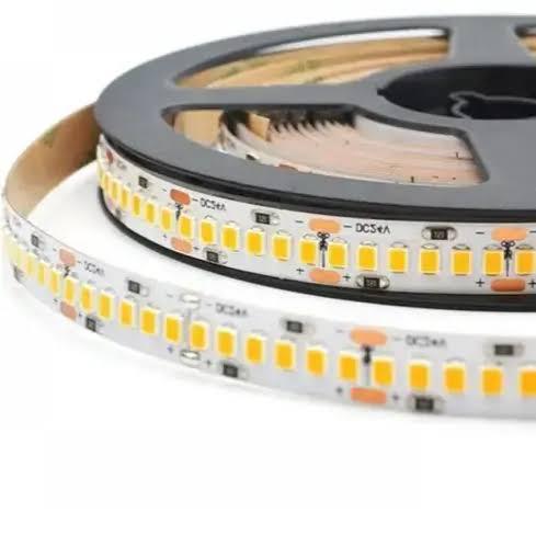 Close-up view of a warm white 3000K LED strip light roll with 240 LEDs per meter