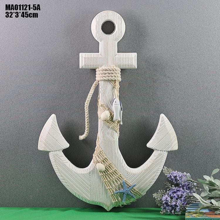 White anchor wall decor hanging on wall