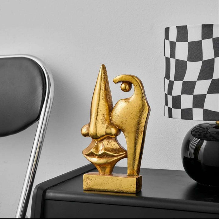 Abstract Gold Face Sculptures