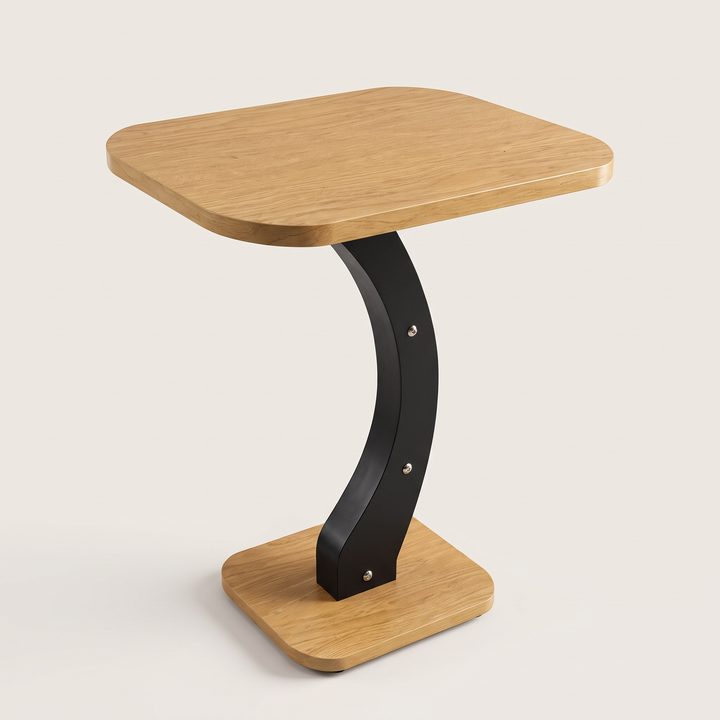 Elevated view of the rounded tabletop, curved black support and matching base