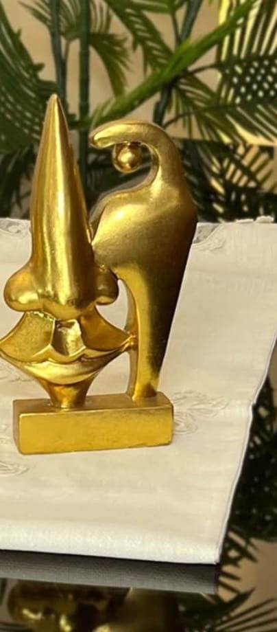 Abstract Gold Face Sculptures