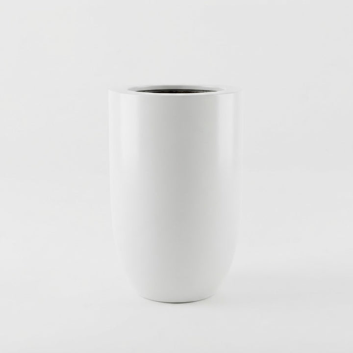 Tall glossy white fiberglass planter with a rounded base on a plain white studio background.