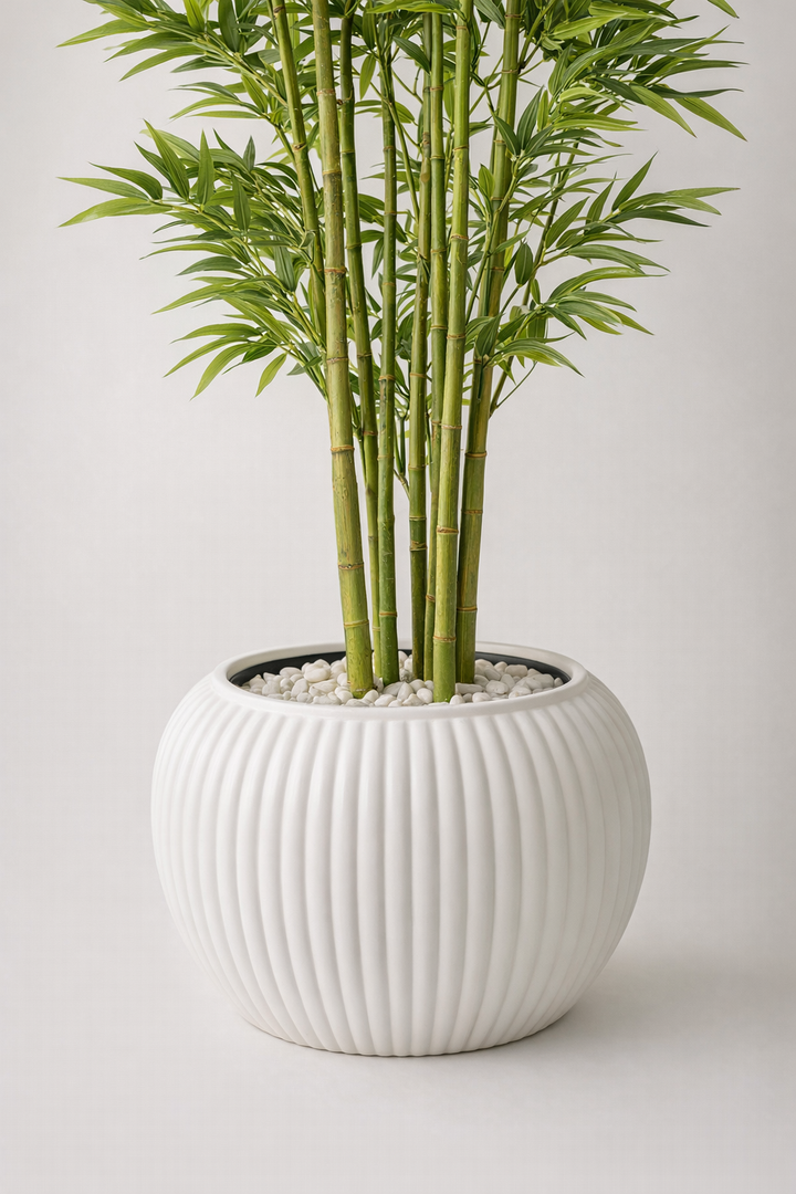 Artificial Bamboo Tree in White Ribbed Pot – 170 cm — trunk and original planter close-up
