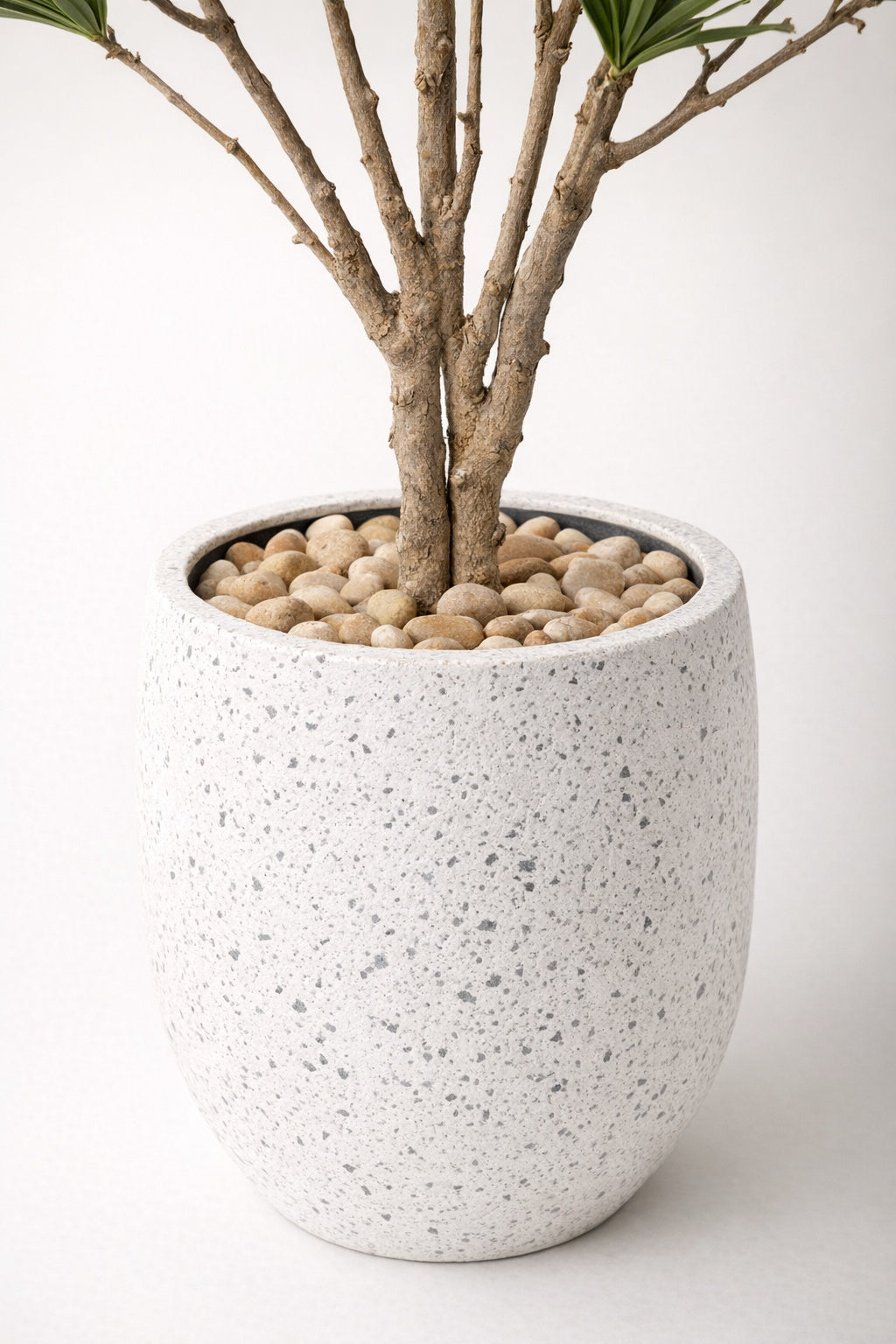 Artificial Green Foliage Tree in White Fiberglass Pot – 180 cm — trunk and original speckled planter close-up