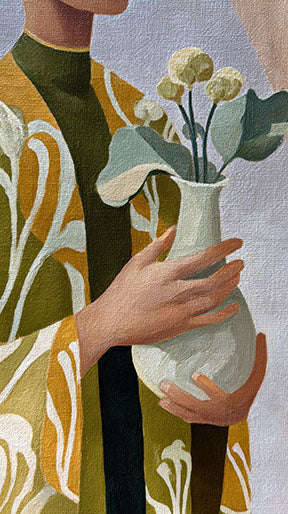 Wadi Home abstract floral vase wall art with figure holding vase in green, yellow, and neutral tones.