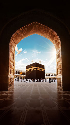 Wadi Home Islamic Archway Wall Art featuring the Kaaba view, blue sky, and ornate architecture.
