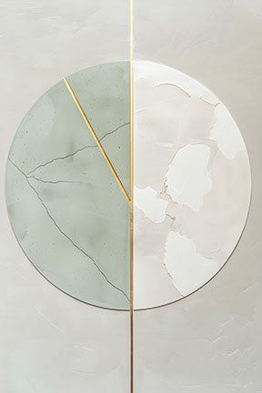 Wadi Home abstract circle canvas art with sage green, beige, and gold details, framed and hung above a sofa.