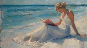 Wadi Home canvas art of a woman in a white dress reading a book on a serene beach with blue ocean waves.