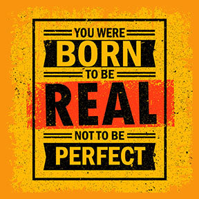 Wadi Home motivational wall art with bold yellow, black, and red typography reading 'You Were Born To Be Real Not To Be Perfect'.