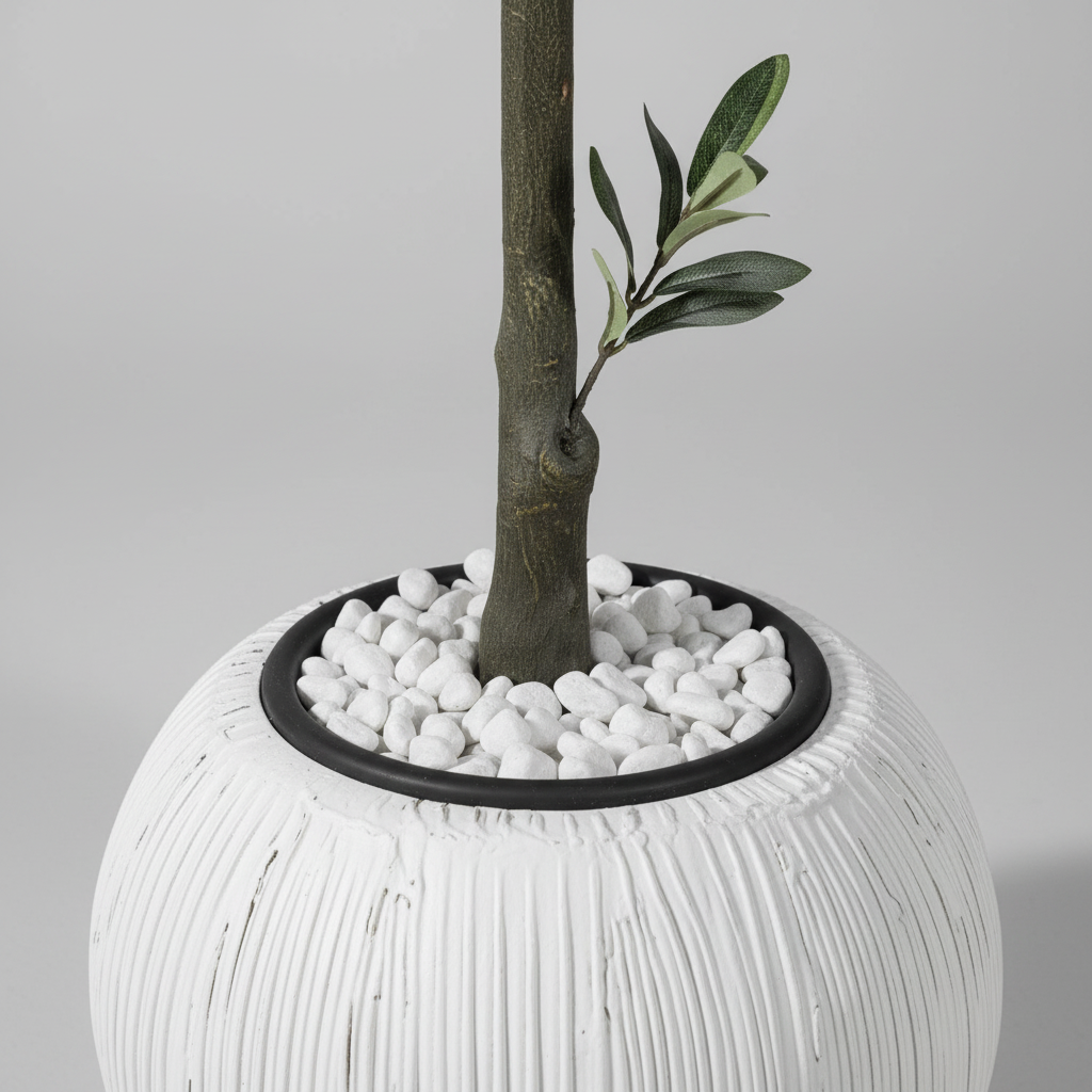 Close-up macro of artificial olive tree pot and lower trunk on gray studio background