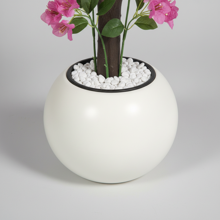 Close-up macro of artificial fern terracotta pot on light gray studio background