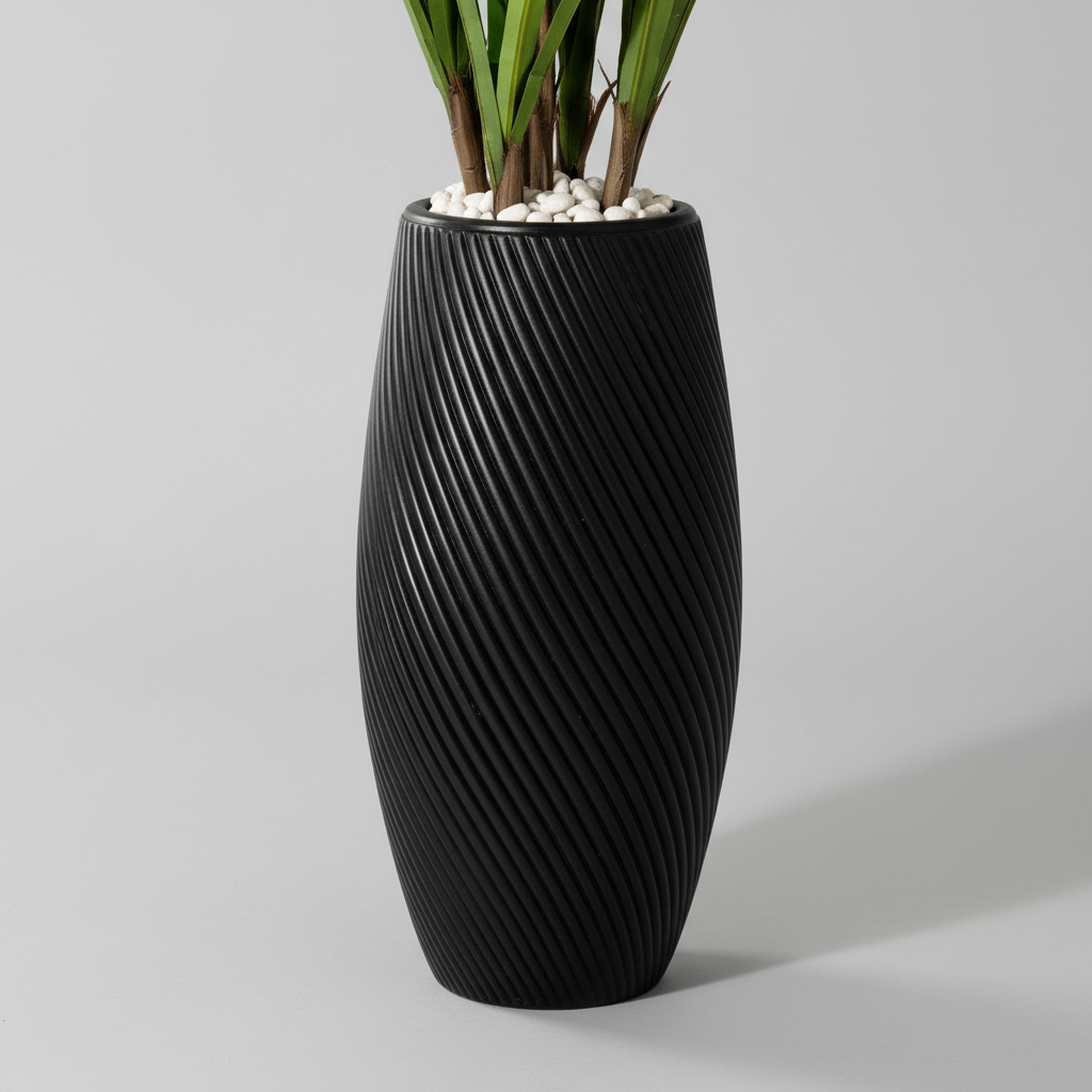 Artificial Peach Orchid Plant - close-up of black ribbed planter with white pebbles