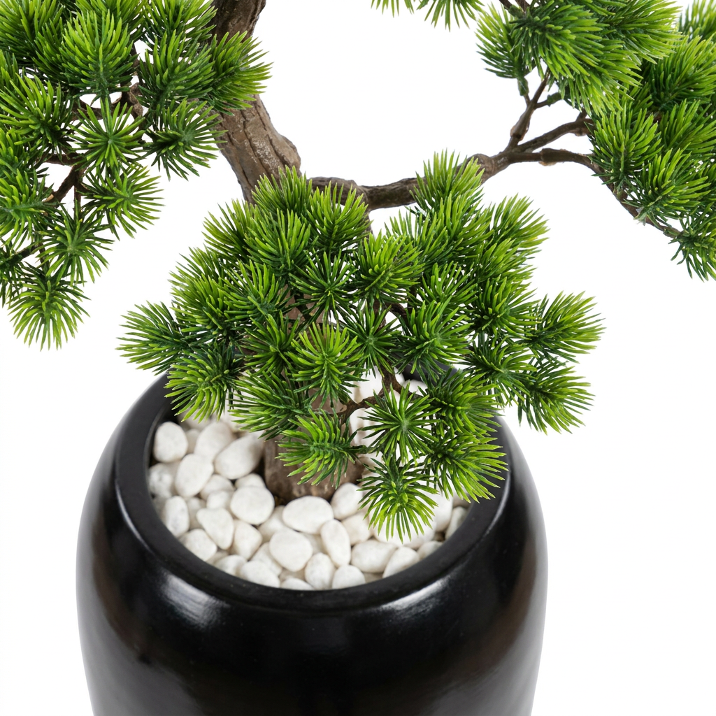 Close-up macro shot of artificial plant leaves with white pebbles