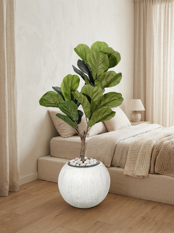 Artificial indoor plant in a minimalist bedroom corner