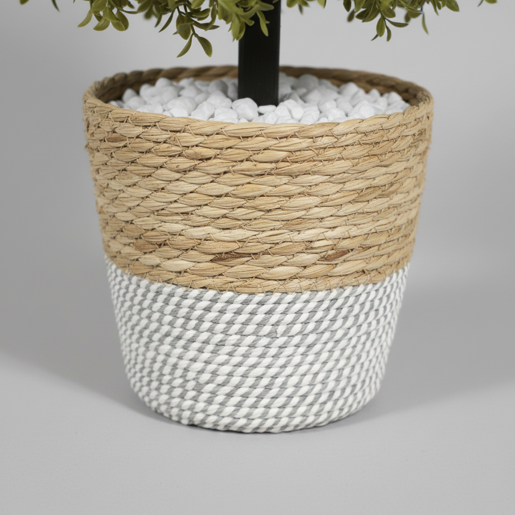 Close-up macro of artificial fern white pot on light gray studio background