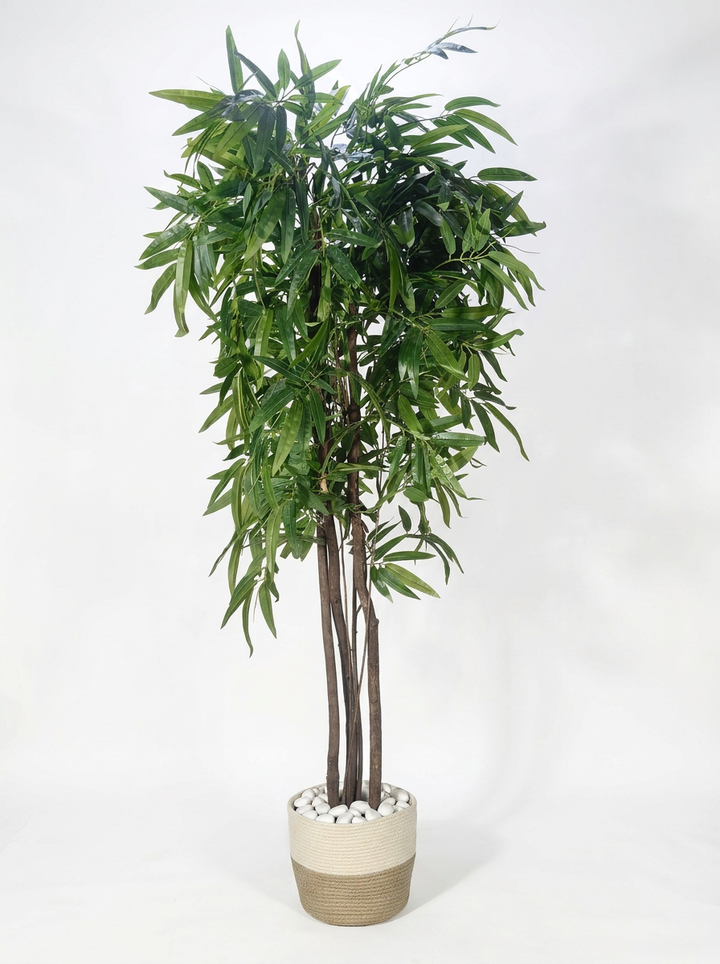 Artificial willow tree with rope pot on white studio background