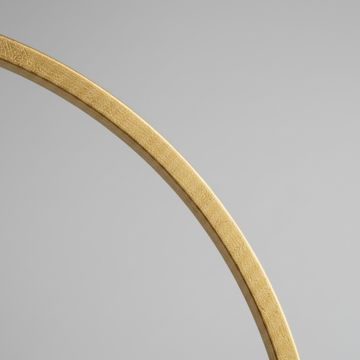 Close-up of the gold mirror frame corner and texture