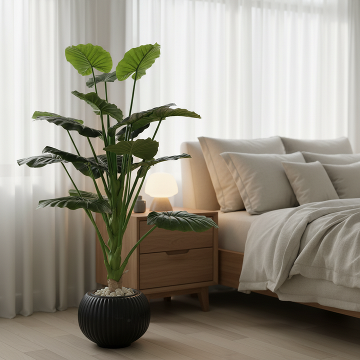Artificial trailing ivy in serene bedroom corner with linen bedding