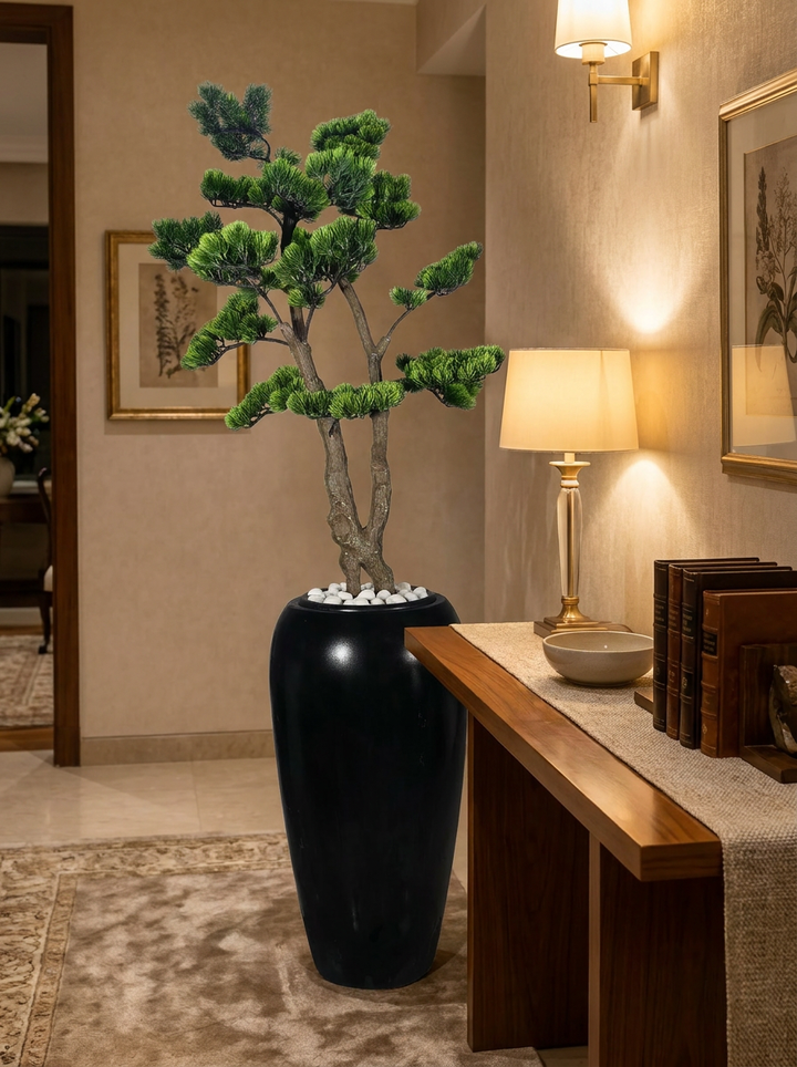 Artificial plant in designer pot in home entryway or office space