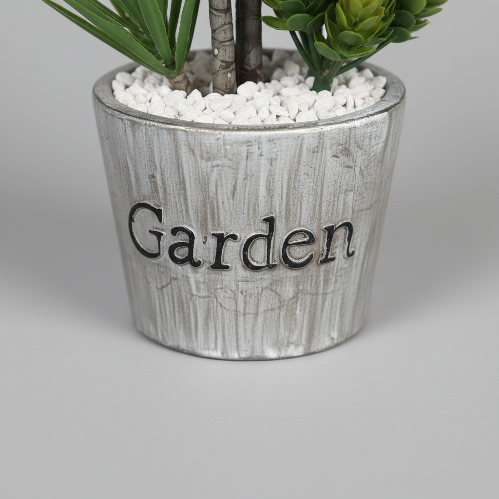 Close-up macro of artificial trailing ivy white pot on light gray studio background