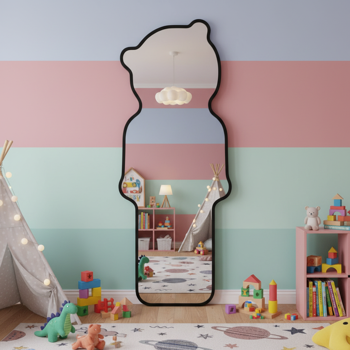 Bear-shaped mirror in playroom as whimsical wall art installation